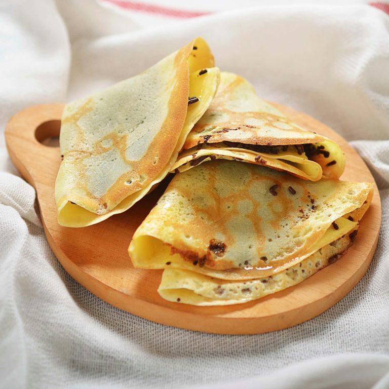 An image of a french crepe with melted chocolate inside
